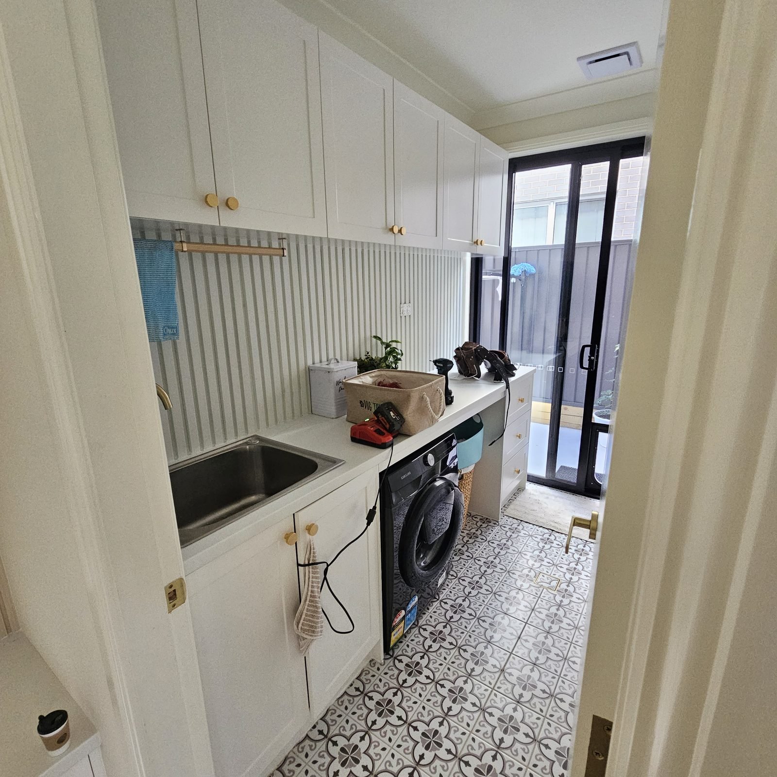 EliteCraft Cabinets — custom laundry project in Sydney