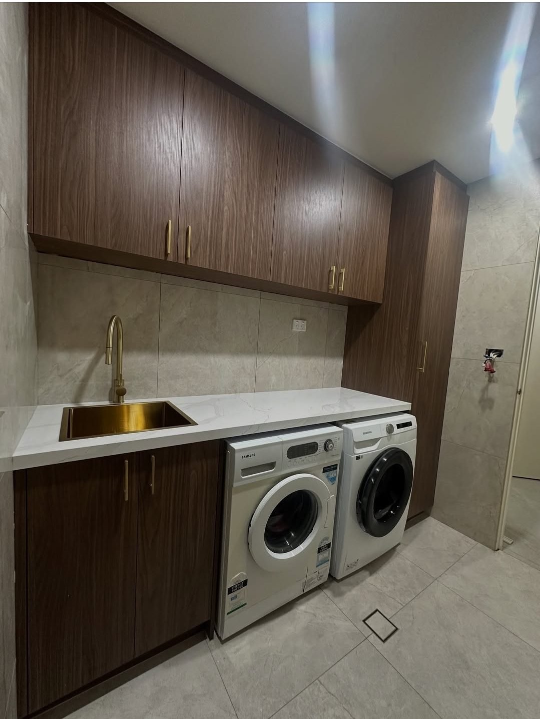 EliteCraft Cabinets — custom laundry project in Sydney